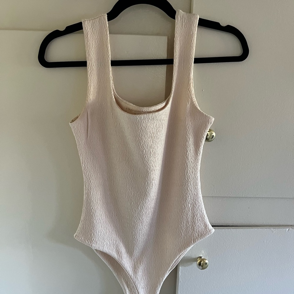 Elegant Cream Textured Bodysuit